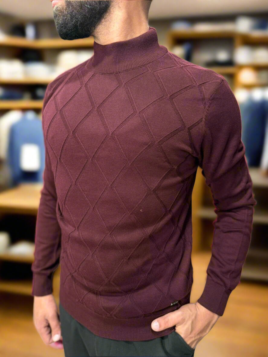 Man wearing a patterned burgundy sweater in a store setting